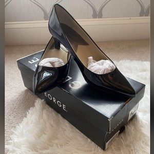 Black patent leather pumps